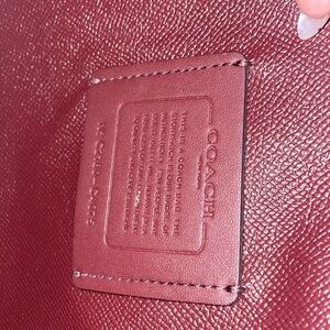 Coach Tatum Carryall in light khaki signature, Pink.